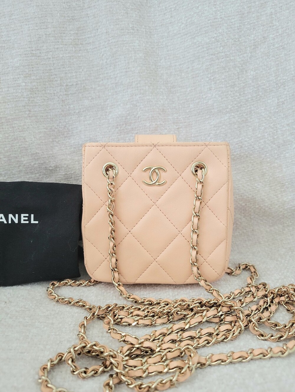 CHANEL Quilted Mini Pochette Crossbody in Light Blush with Gold Hardware